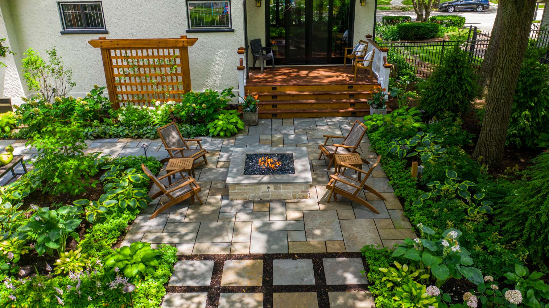 Outdoor Fireplace vs. Fire Pit Choosing What’s Best For Your Landscape